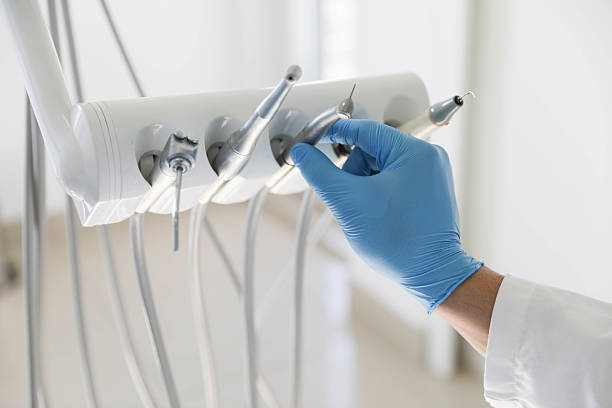 Professional Tooth Extraction technician working in Travis Ranch, TX